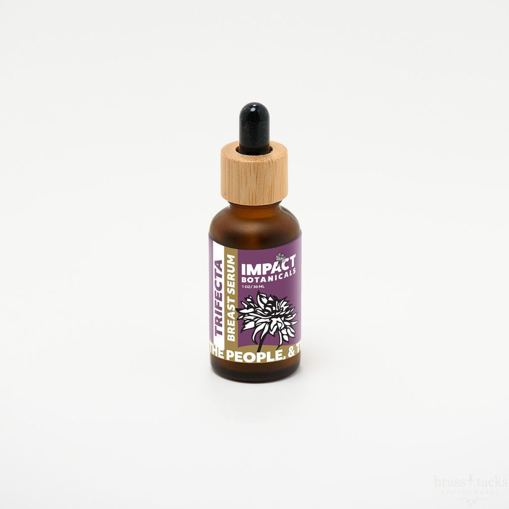Amber glass bottle of Impact Botanicals Trifecta Breast Serum with a bamboo dropper top.
