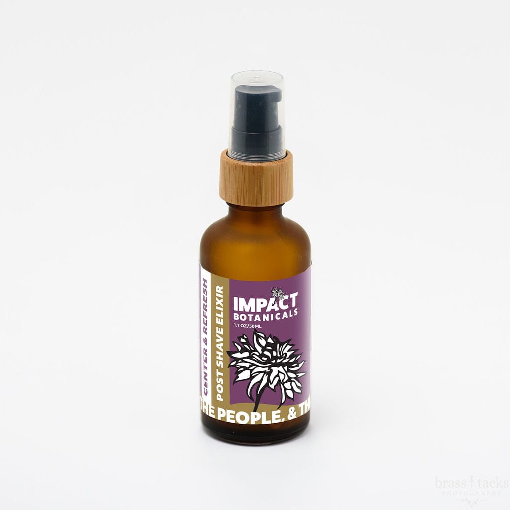Amber glass bottle of Impact Botanicals Center & Refresh Post Shave Elixir with a black pump top and bamboo accent.